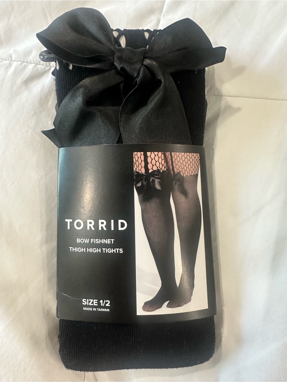 torrid Black Bow Fishnet Thigh High Tights